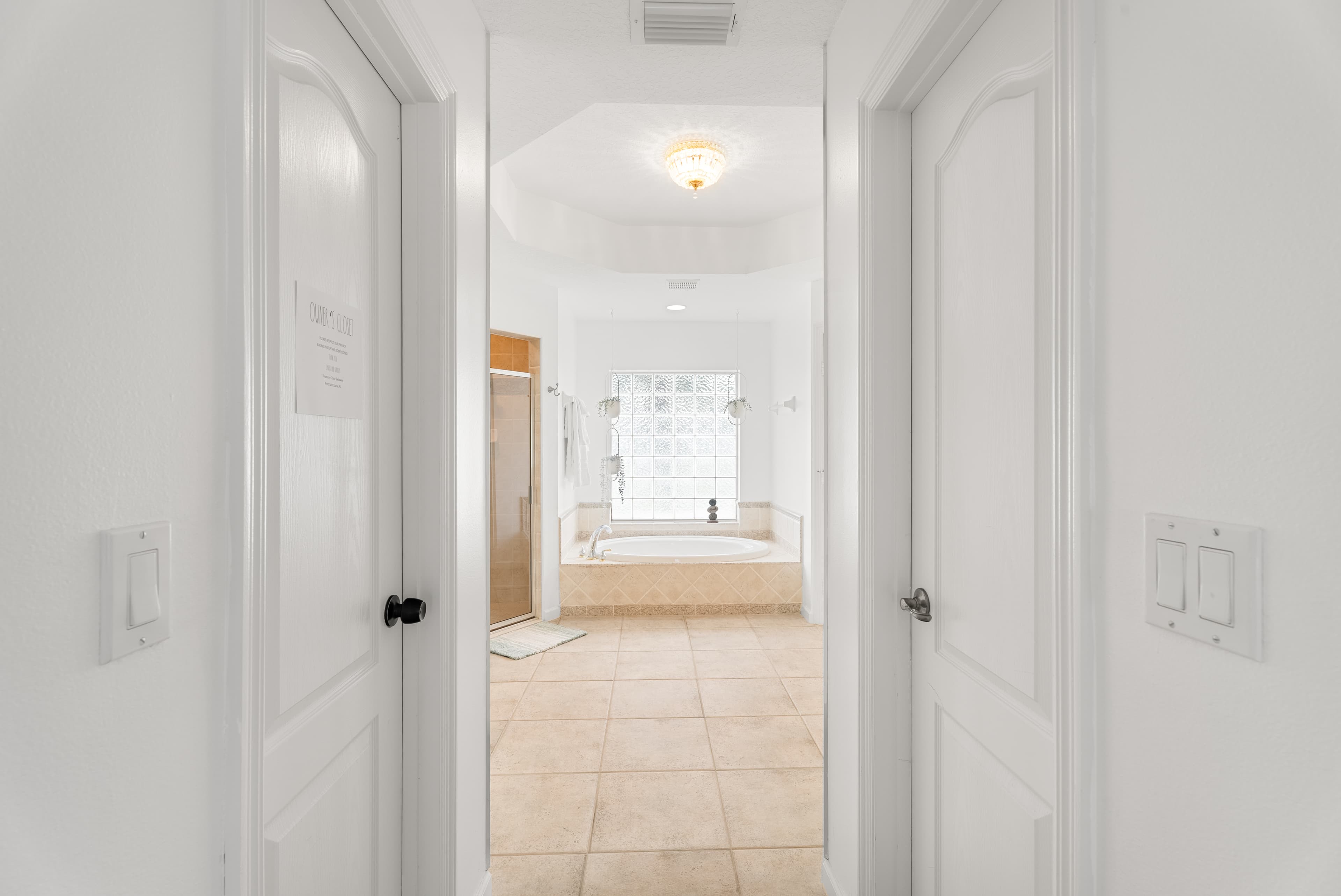 Entrance hallway to master bathroom suite