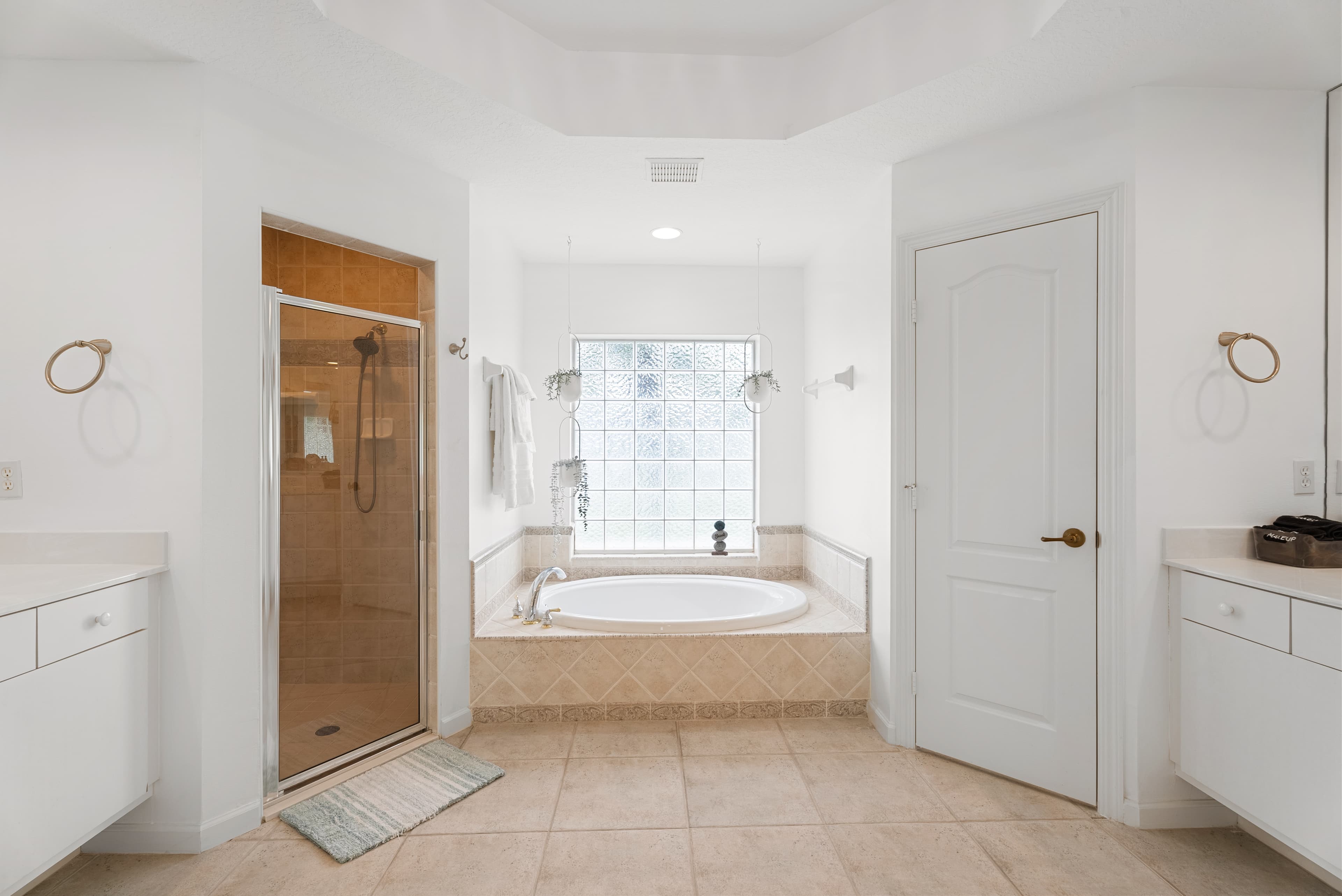 Luxurious master bathroom with dual vanity
