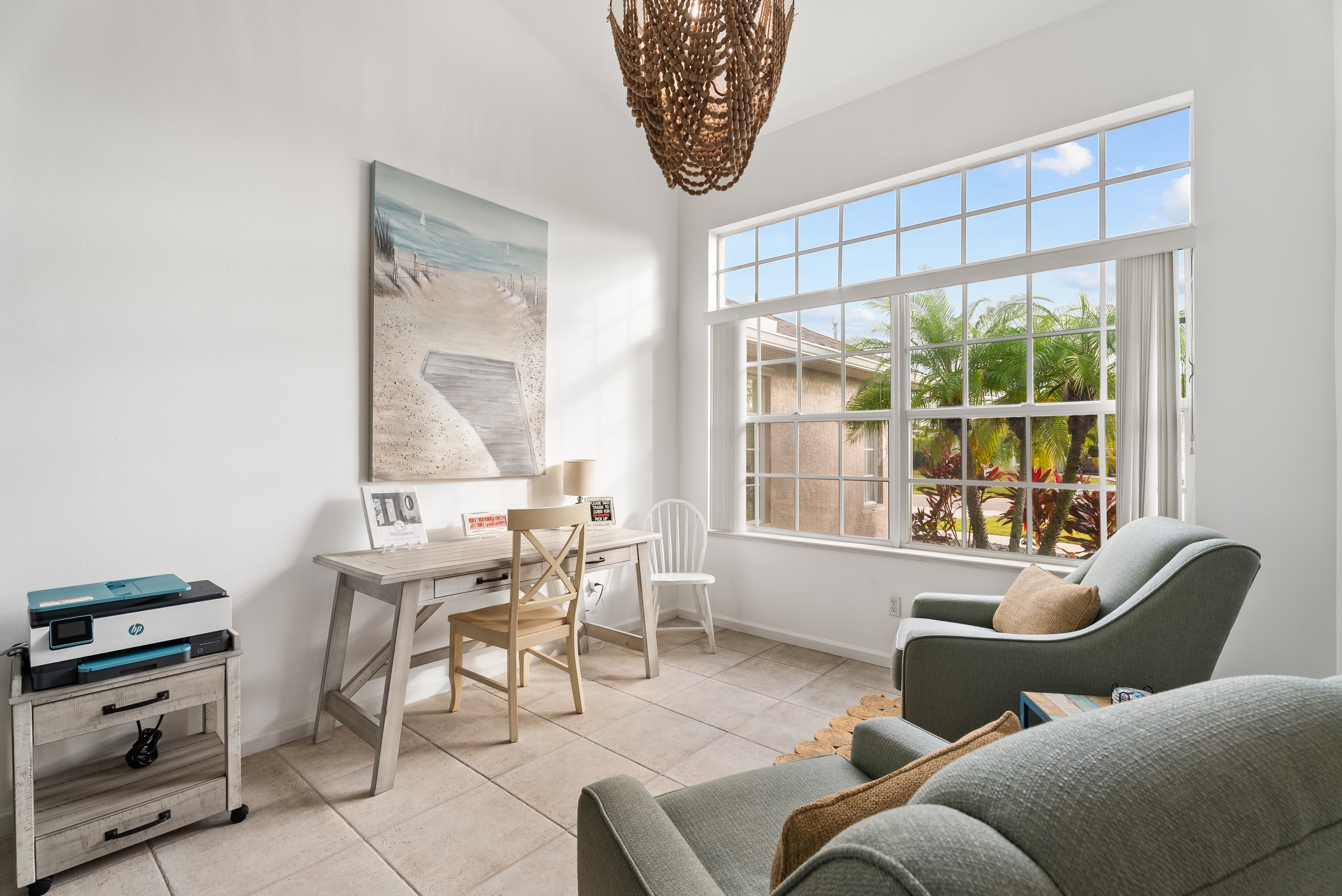 Home office space with desk and printer