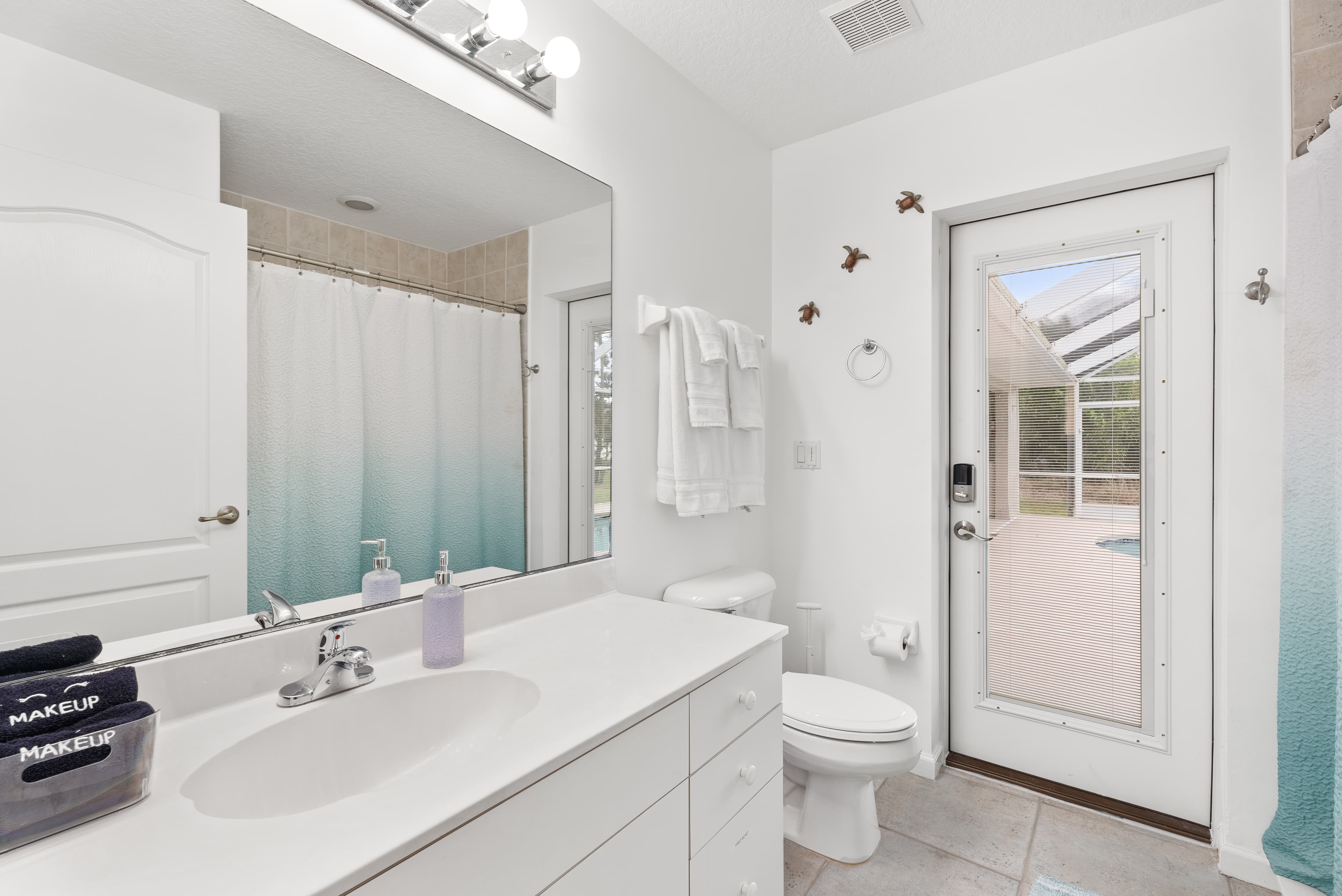 Convenient poolside guest bathroom