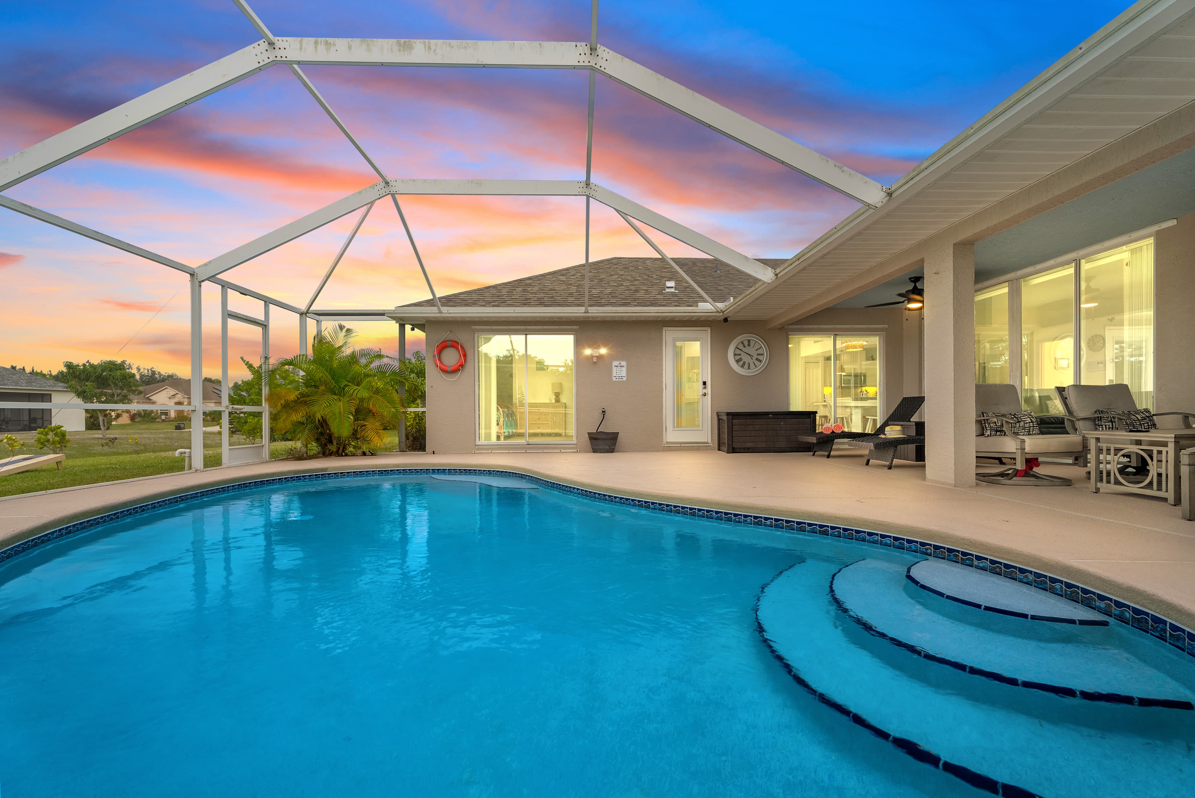 Private heated swimming pool and patio area