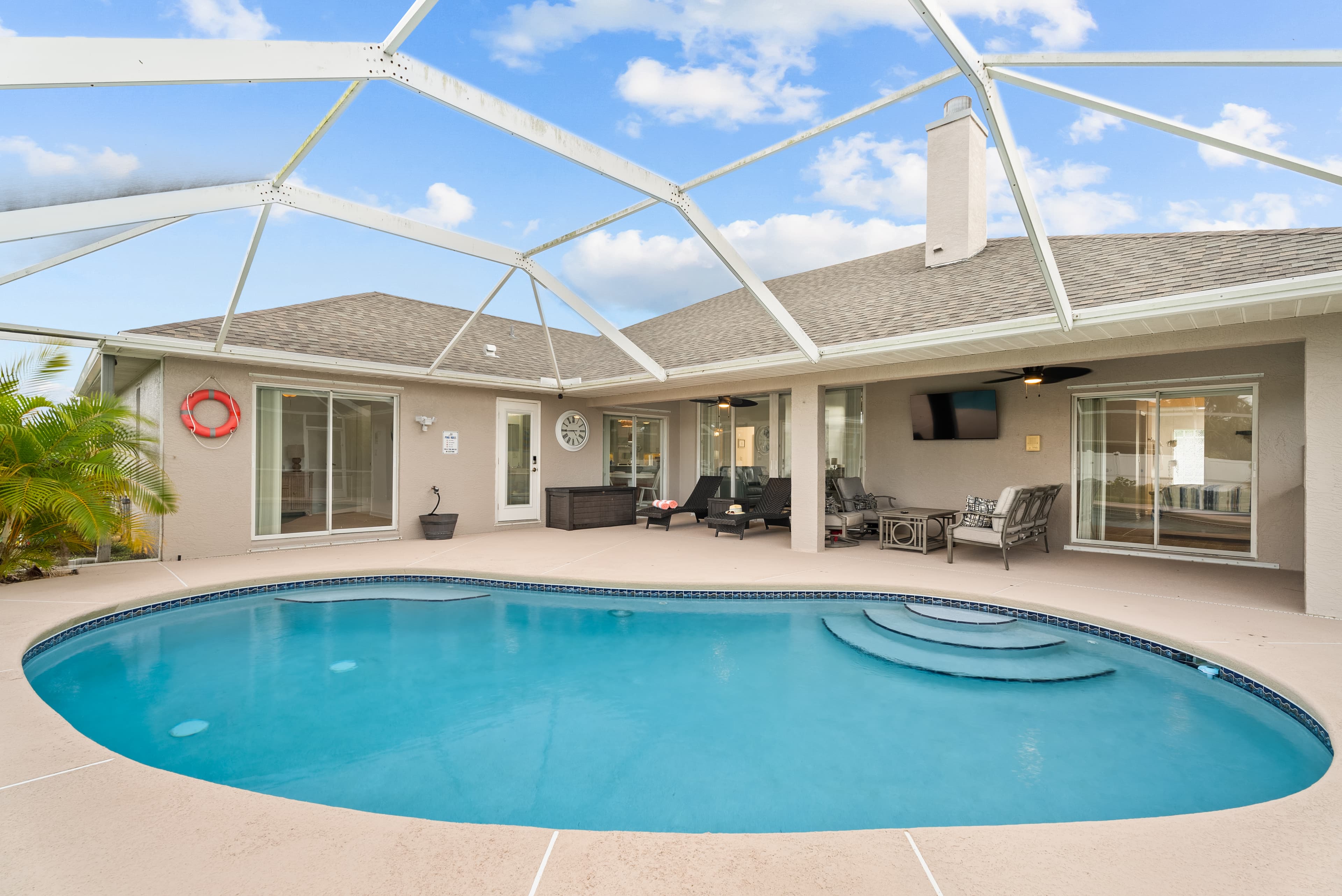 Pool area with beautiful Florida sunshine
